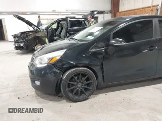 2013 Kia Rio SX with VIN KNADN4A38D6229948, listed as a IAAI auction lot 42007877 with 126,695 mi miles. Bid and sale history available at carsss.com. Image 6.
