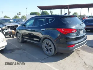 2016 Hyundai Santa Fe z VIN 5XYZT3LB6GG379054, wystawiony jako IAAI lot #42406174 z przebiegiem 182 073 mil mil oraz . Historia ofert i sprzedaży dostępna na DreamBid. Obrazek 3.
