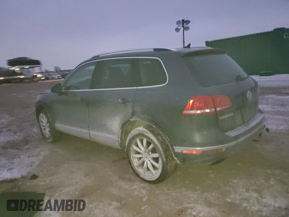 2016 Volkswagen Touareg Sport with VIN WVGEF9BP2GD005296, listed as a Copart auction lot 88808735 with 133,429 mi miles and Salvage Title. Bid and sale history available at DreamBid. Image 2.
