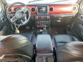 2021 Jeep Wrangler Unlimited Rubicon with VIN 1C4HJXFG0MW616829, listed as a Copart auction lot 61041425 with 128,724 mi miles and Salvage title. Bid and sale history available at DreamBid. Image 8.