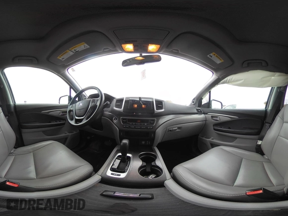 2017 Honda Pilot EX-L with VIN 5FNYF6H5XHB014067, listed as a IAAI auction lot 42083742 with 143,043 mi miles and . Bid and sale history available at DreamBid. Image 18.