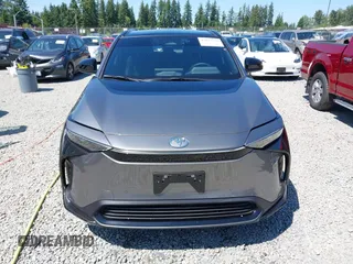 2024 Toyota bZ4X XLE z VIN JTMABACA5RA070254, wystawiony jako IAAI lot #42427736 z przebiegiem 5 718 mil mil oraz . Historia ofert i sprzedaży dostępna na DreamBid. Obrazek 12.