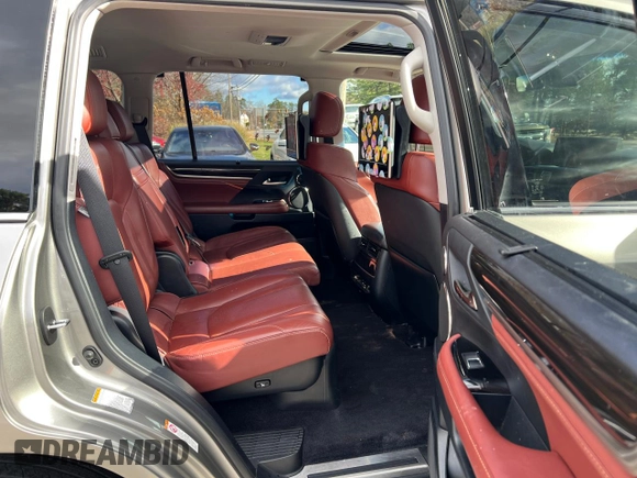 2016 Lexus LX 570 with VIN JTJHY7AX7G4203810, listed as a Copart auction lot 80800914 with 296,703 mi miles and Clean Title. Bid and sale history available at DreamBid. Image 6.