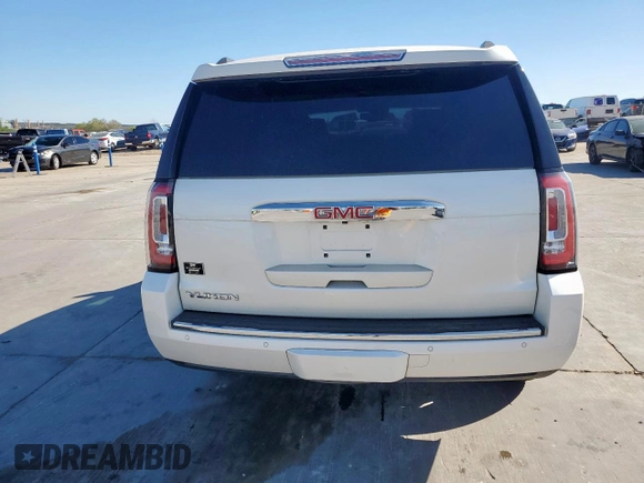 2015 GMC Yukon Denali z VIN 1GKS2CKJ6FR706151, wystawiony jako Copart lot #50556805 z przebiegiem 174 259 mil mil oraz Czysty tytuł • Clean title. Historia ofert i sprzedaży dostępna na DreamBid. Obrazek 6.