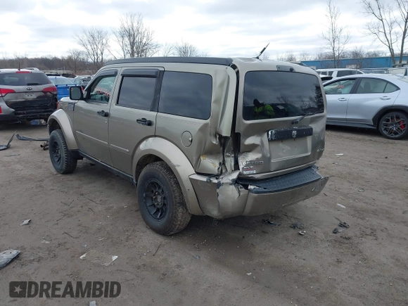 2007 Dodge Nitro SLT z VIN 1D8GU58K97W700047, wystawiony jako IAAI lot #41805822 z przebiegiem 186 604 mil mil oraz . Historia ofert i sprzedaży dostępna na DreamBid. Obrazek 3.