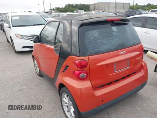 2008 Smart fortwo Pure z VIN WMEEJ31X28K206311, wystawiony jako IAAI lot #42269686 z przebiegiem 48 601 mil mil oraz . Historia ofert i sprzedaży dostępna na DreamBid. Obrazek 3.