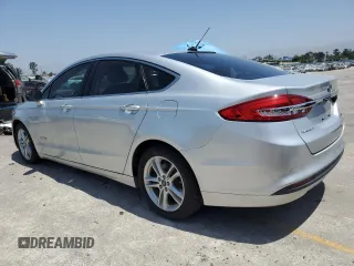 2018 Ford Fusion SE z VIN 3FA6P0LU8JR110693, wystawiony jako Copart lot #61931995 z przebiegiem 119 629 mil mil oraz Szkoda całkowita • Salvage title. Historia ofert i sprzedaży dostępna na DreamBid. Obrazek 2.