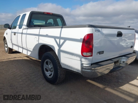 2002 Ford F-150 XL with VIN 1FTRX17W82NB78988, listed as a IAAI auction lot 41490173 with 1 mi miles. Bid and sale history available at carsss.com. Image 3.