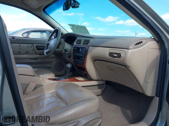 2004 Mercury Sable LS Premium z VIN 1MEFM59S74A609472, wystawiony jako IAAI lot #41971270 z przebiegiem 181 289 mil mil oraz . Historia ofert i sprzedaży dostępna na DreamBid. Obrazek 5.