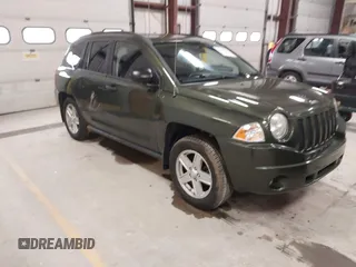 2008 Jeep Compass Sport with VIN 1J8FF47W28D534267, listed as a IAAI auction lot 42009243 with 122,720 mi miles. Bid and sale history available at carsss.com. Image 1.
