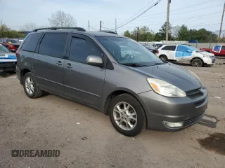2005 Toyota Sienna XLE with VIN 5TDBA22C65S035980, listed as a Copart auction lot 54448335 with 292,194 mi miles and Salvage Title. Bid and sale history available at DreamBid. Image 4.