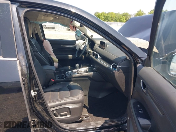2020 Mazda CX-5 Grand Touring with VIN JM3KFADM9L1837183, listed as a IAAI auction lot 42340628 with 81,975 mi miles and . Bid and sale history available at DreamBid. Image 5.