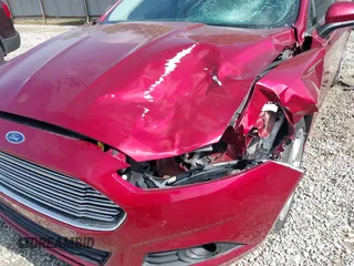 2016 Ford Fusion S z VIN 3FA6P0G70GR325773, wystawiony jako IAAI lot #42250513 z przebiegiem 167 224 mil mil oraz . Historia ofert i sprzedaży dostępna na DreamBid. Obrazek 6.