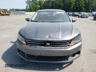 2017 Volkswagen Passat S z VIN 1VWAT7A38HC056059, wystawiony jako Copart lot #57657135 z przebiegiem 117 504 mil mil oraz Szkoda całkowita • Salvage title. Historia ofert i sprzedaży dostępna na DreamBid. Obrazek 5.