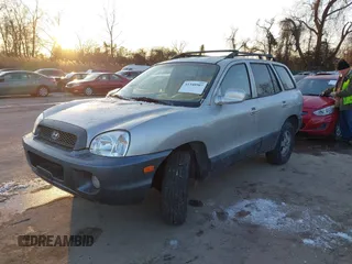 2003 Hyundai Santa Fe GLS with VIN KM8SC73D73U518784, listed as a IAAI auction lot 41348907 with 127,980 mi miles. Bid and sale history available at carsss.com. Image 2.
