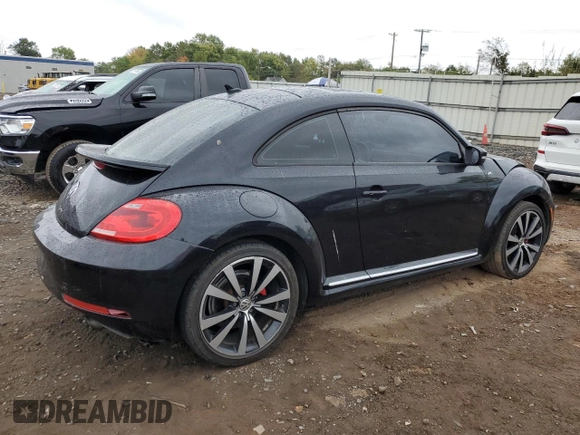 2014 Volkswagen Beetle Turbo R-Line with VIN 3VWVT7AT2EM603435, listed as a Copart auction lot 72755524 with 99,300 mi miles and Salvage Title. Bid and sale history available at DreamBid. Image 3.