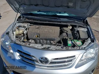 2013 Toyota Corolla L with VIN 2T1BU4EEXDC089189, listed as a IAAI auction lot 41818437 with 143,706 mi miles and . Bid and sale history available at DreamBid. Image 10.