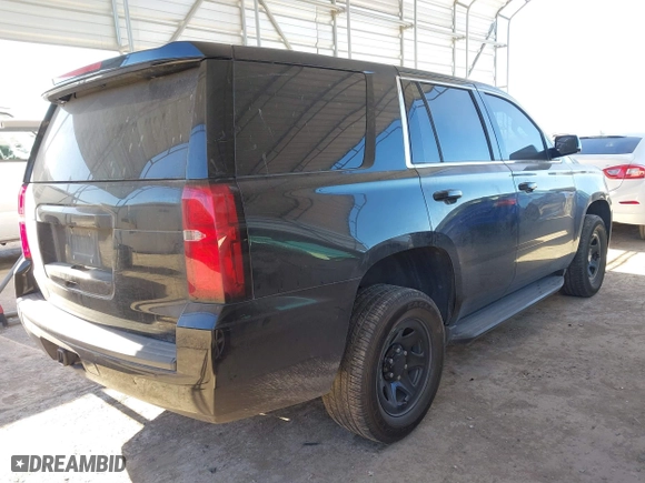2017 Chevrolet Tahoe Commercial with VIN 1GNLCDEC8HR385630, listed as a IAAI auction lot 41262095 with 182,011 mi miles. Bid and sale history available at carsss.com. Image 4.