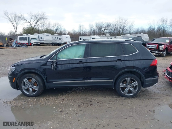 2019 Volkswagen Tiguan SEL Premium with VIN 3VV4B7AXXKM053709, listed as a IAAI auction lot 40840656 with 60,970 mi miles. Bid and sale history available at carsss.com. Image 14.