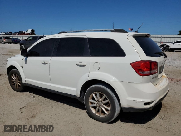 2017 Dodge Journey SXT with VIN 3C4PDCBG3HT591244, listed as a Copart auction lot 55197655 with 202,469 mi miles and Salvage Title. Bid and sale history available at DreamBid. Image 2.
