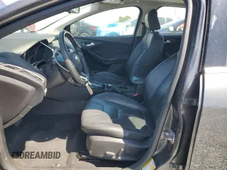 2015 Ford Focus Titanium with VIN 1FADP3N24FL260486, listed as a Copart auction lot 49856865 with Not provided miles and Clean title. Bid and sale history available at DreamBid. Image 7.