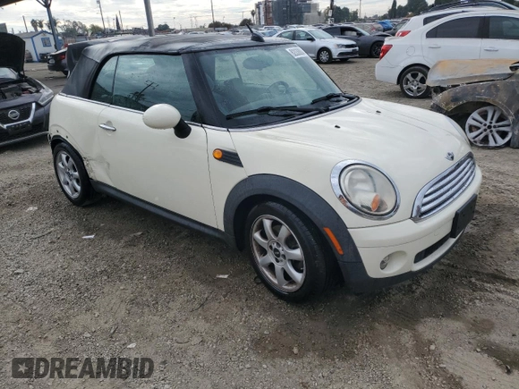 2010 MINI Convertible with VIN WMWMR3C52ATU96951, listed as a Copart auction lot 82038804 with 120,199 mi miles and Clean Title. Bid and sale history available at DreamBid. Image 4.