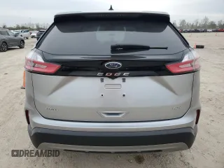 2023 Ford Edge SEL z VIN 2FMPK4J90PBA38667, wystawiony jako Copart lot #87404284 z przebiegiem Nie podano mil oraz Szkoda całkowita • Salvage title. Historia ofert i sprzedaży dostępna na DreamBid. Obrazek 6.