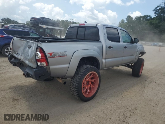 2015 Toyota Tacoma with VIN 5TFLU4EN5FX132006, listed as a Copart auction lot 59285655 with 205,932 mi miles and Salvage title. Bid and sale history available at DreamBid. Image 3.