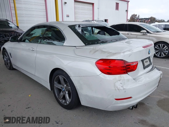 2015 BMW 4 Series 428i with VIN WBA3V7C5XFP772663, listed as a IAAI auction lot 42101012 with 75,901 mi miles and . Bid and sale history available at DreamBid. Image 3.