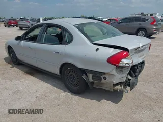 2005 Ford Taurus SE with VIN 1FAFP53U85A102770, listed as a IAAI auction lot 41963794 with 174,380 mi miles. Bid and sale history available at carsss.com. Image 3.