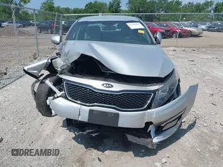 2014 Kia Optima LX with VIN 5XXGM4A76EG316577, listed as a IAAI auction lot 42594090 with 68,979 mi miles and . Bid and sale history available at DreamBid. Image 12.