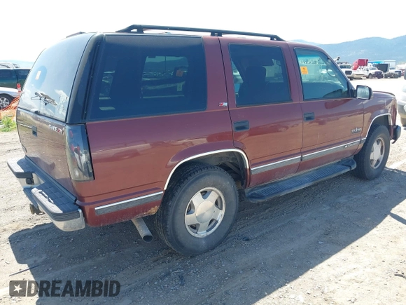 1999 Chevrolet Tahoe Z71 with VIN 1GNEK13R4XJ341736, listed as a IAAI auction lot 42218712 with 282,663 mi miles and . Bid and sale history available at DreamBid. Image 4.
