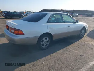 1997 Lexus ES 300 z VIN JT8BF22G5V0060245, wystawiony jako IAAI lot #42368851 z przebiegiem 241 736 mil mil oraz . Historia ofert i sprzedaży dostępna na DreamBid. Obrazek 4.