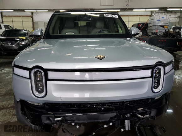 2024 Rivian R1S Adventure with VIN 7PDSGBBA5RN032652, listed as a Copart auction lot 87921275 with 8,431 mi miles and Salvage Title. Bid and sale history available at carsss.com. Image 5.