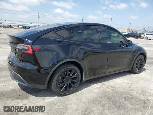 2020 Tesla Model Y Long Range with VIN 5YJYGDEE6LF051549, listed as a Copart auction lot 55063805 with 77,861 mi miles and Salvage Title. Bid and sale history available at DreamBid. Image 3.