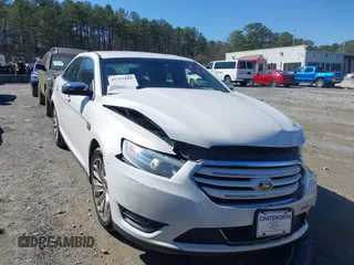 2014 Ford Taurus Limited with VIN 1FAHP2F82EG168704, listed as a IAAI auction lot 41753102 with 74,218 mi miles. Bid and sale history available at carsss.com. Image 1.