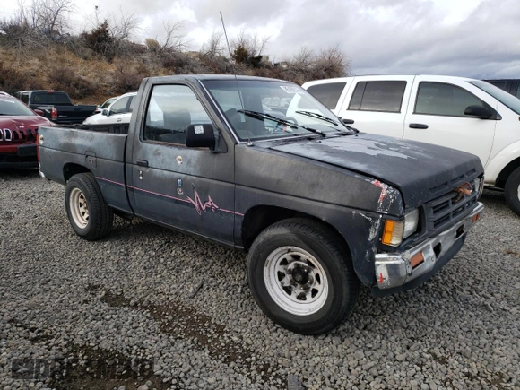 1991 Nissan Frontier with VIN 1N6SD11S9MC419923, listed as a Copart auction lot 85189314 with 245,003 mi miles and Salvage title. Bid and sale history available at DreamBid. Image 4.