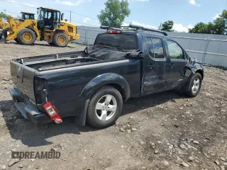 2007 Nissan Frontier SE with VIN 1N6AD09W47C428451, listed as a Copart auction lot 61809095 with 101,969 mi miles and Salvage title. Bid and sale history available at DreamBid. Image 3.