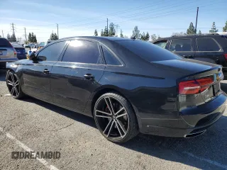 2016 Audi A8 3.0T with VIN WAU34AFD8GN009945, listed as a Copart auction lot 88804115 with 102,341 mi miles and Salvage Title. Bid and sale history available at DreamBid. Image 2.