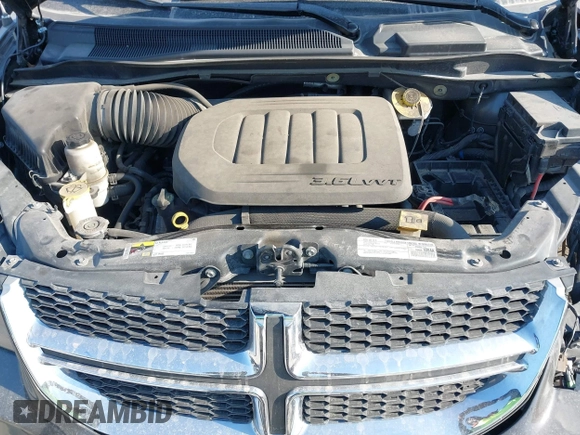 2019 Dodge Grand Caravan SE with VIN 2C4RDGBGXKR727315, listed as a IAAI auction lot 41770222 with 97,561 mi miles and . Bid and sale history available at DreamBid. Image 10.