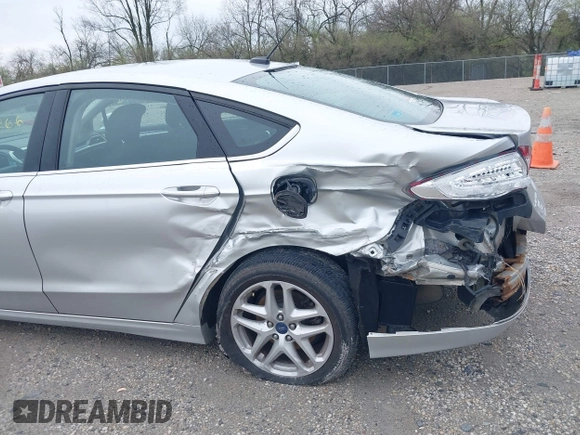 2015 Ford Fusion SE z VIN 1FA6P0H75F5112124, wystawiony jako IAAI lot #41957866 z przebiegiem 199 242 mil mil oraz . Historia ofert i sprzedaży dostępna na DreamBid. Obrazek 6.