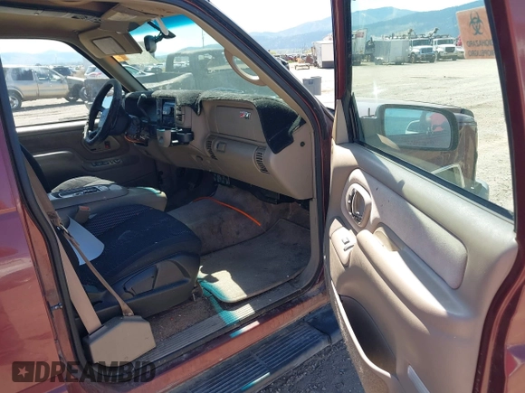 1999 Chevrolet Tahoe Z71 with VIN 1GNEK13R4XJ341736, listed as a IAAI auction lot 42218712 with 282,663 mi miles and . Bid and sale history available at DreamBid. Image 5.