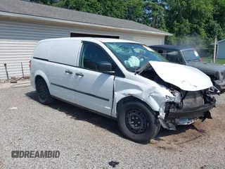 2014 Ram Cargo Van Tradesman with VIN 2C4JRGAG4ER433283, listed as a IAAI auction lot 42593737 with 187,933 mi miles and . Bid and sale history available at DreamBid. Image 1.