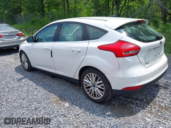 2016 Ford Focus Titanium with VIN 1FADP3N26GL332709, listed as a IAAI auction lot 42458997 with 75,509 mi miles and . Bid and sale history available at DreamBid. Image 3.