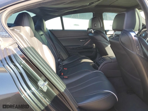 2015 BMW 6 Series 650i with VIN WBA6B2C58FD799063, listed as a Copart auction lot 77819914 with 0 mi miles and Salvage Title. Bid and sale history available at carsss.com. Image 10.