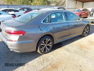 2021 Volkswagen Passat 2.0T SE with VIN 1VWSA7A3XMC008583, listed as a IAAI auction lot 41786307 with 56,446 mi miles. Bid and sale history available at carsss.com. Image 4.
