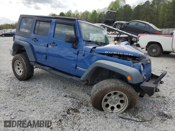 2009 Jeep Wrangler Unlimited Rubicon with VIN 1J4GA69169L762992, listed as a Copart auction lot 51674355 with 147,181 mi miles and Salvage title. Bid and sale history available at DreamBid. Image 4.
