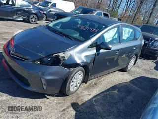 2014 Toyota Prius Two z VIN JTDZN3EU2E3293170, wystawiony jako IAAI lot #41721493 z przebiegiem 186 801 mil mil oraz . Historia ofert i sprzedaży dostępna na DreamBid. Obrazek 2.