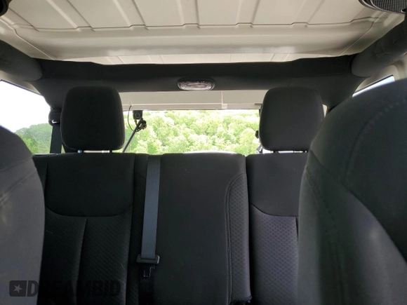 2018 Jeep Wrangler Unlimited Sport with VIN 1C4BJWDG9JL910410, listed as a Copart auction lot 56561955 with 57,450 mi miles and Salvage title. Bid and sale history available at DreamBid. Image 10.