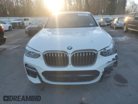 2019 BMW X4 M40i with VIN 5UXUJ5C55KLJ64105, listed as a Copart auction lot 87162014 with 92,946 mi miles and Salvage title. Bid and sale history available at DreamBid. Image 5.